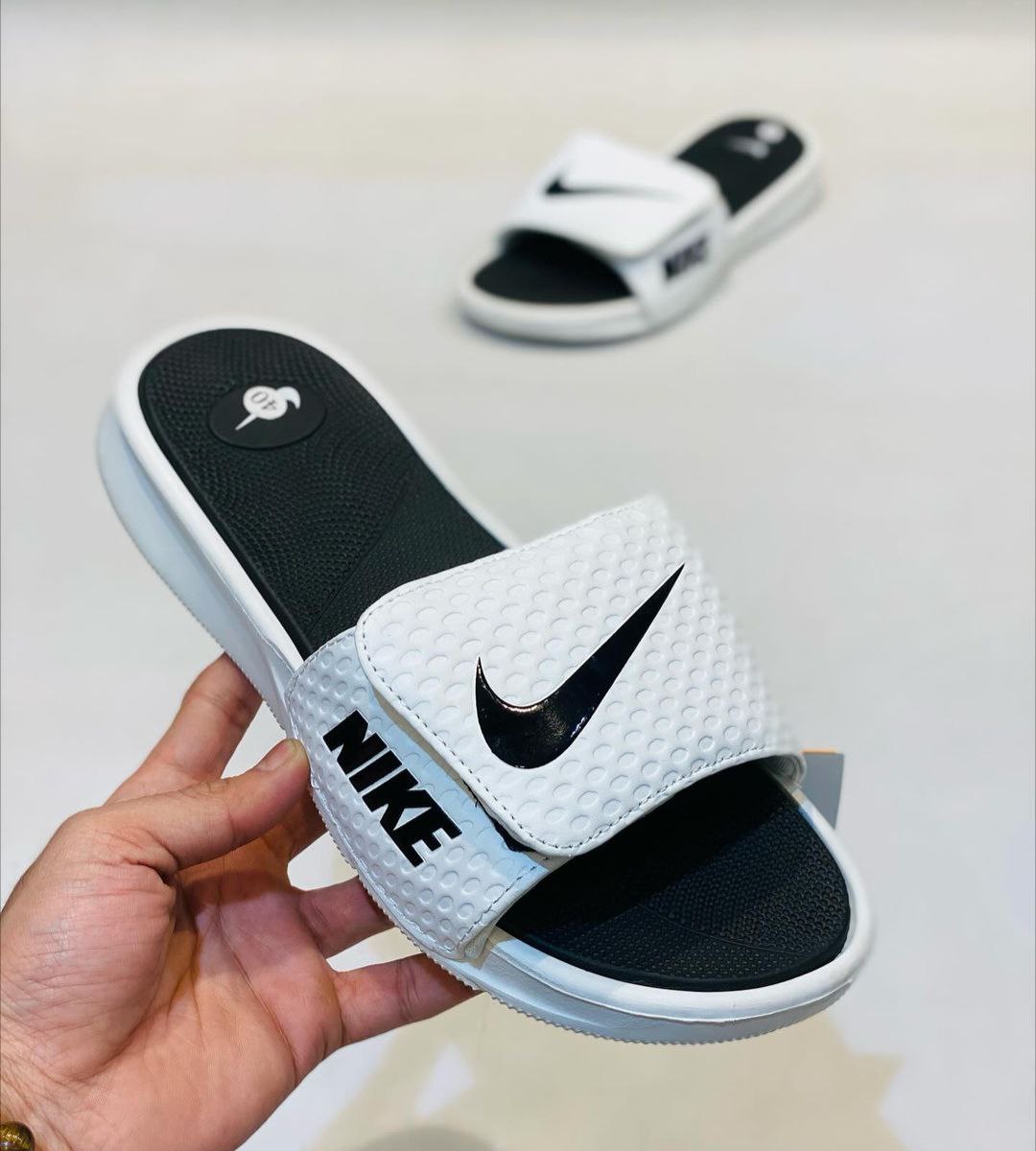 Black and white nike slides mens on sale